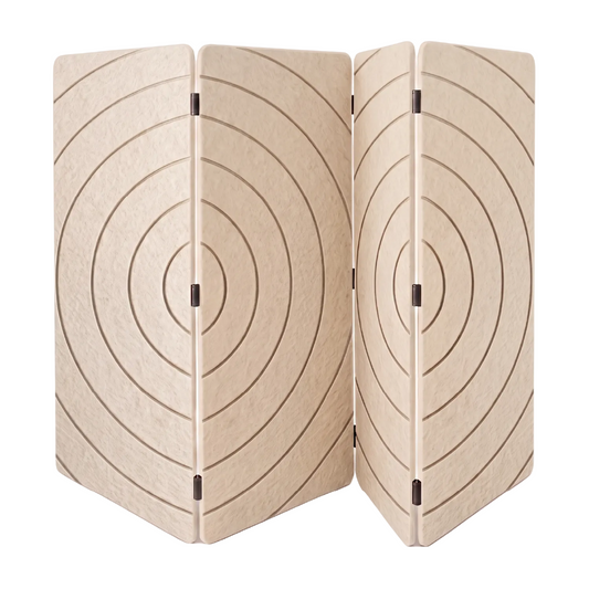 A light beige foldable screen with a circular target design etched or printed on each panel, shown against a plain white background.