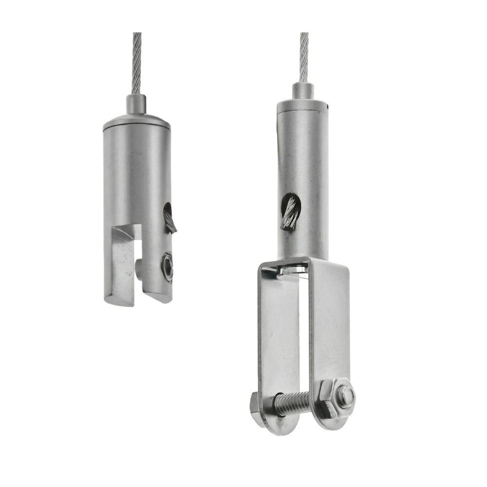 Two metal pulley systems with cables on a white background