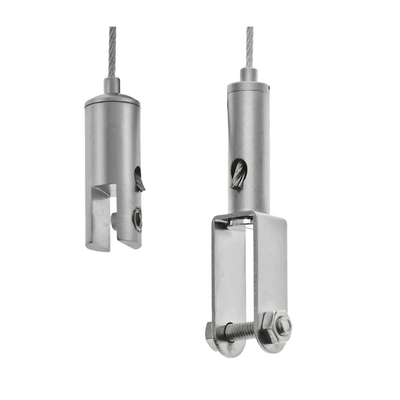Two metal pulley systems with cables on a white background