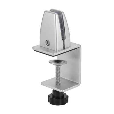 Metal clamp with adjustable screw on a white background