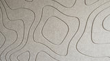 Current engraved felt wall panels in Natural Cotton, close-up of the engraved grooves