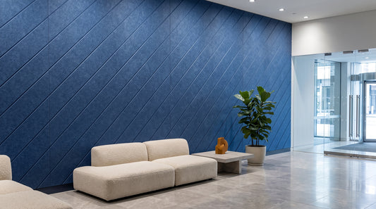 Diagonal engraved felt wall panels in Cornflower Blue, in a reception area