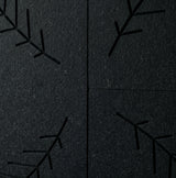 Fern engraved felt wall panels in Black, close-up of the engraved grooves
