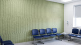 Jog engraved felt wall panels in Tea Green, in a healthcare waiting area