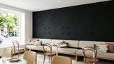 Lotus engraved felt wall panels in Black, in a restaurant