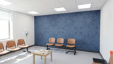 Lotus engraved felt wall panels in Steel Blue, in a clinic waiting area