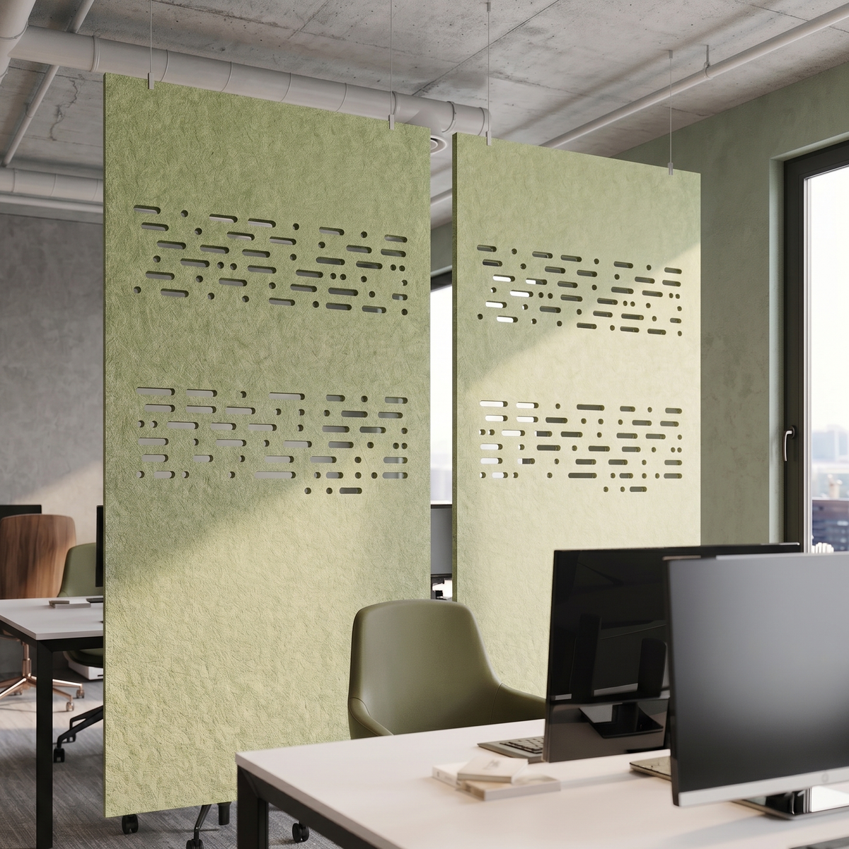 Tea green felt room divider with a dot and dash cut-out pattern zoning an open-plan office