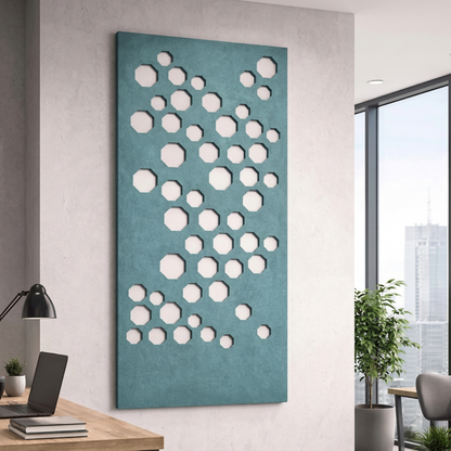 Modern office interior with a decorative wall panel featuring circular patterns.