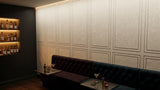 Panelled engraved felt wall panels in Natural Cotton, behind a bar