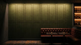 Panelled engraved felt wall panels in Olive Green, behind a bar