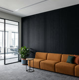 Pulse engraved felt wall panels in Black, in an office