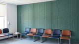 Pulse engraved felt wall panels in Sage Green, in a healthcare waiting area