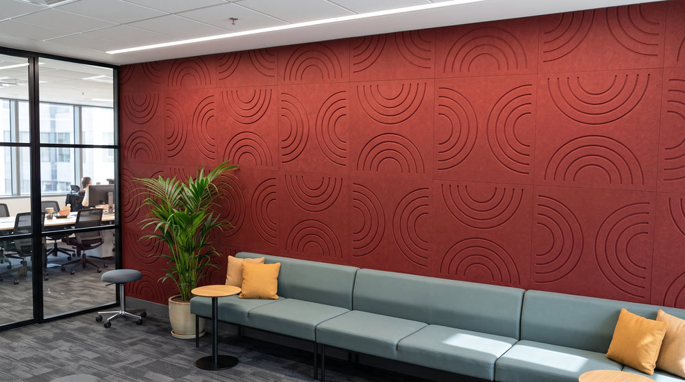 Rainbow engraved felt wall panels in Dark Rouge, in an office
