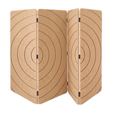 A three-panel folding screen made of light natural wood with engraved concentric circle patterns, shown against a plain white background.
