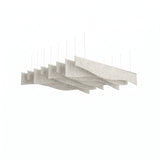 Ruche acoustic ceiling baffle kit in Natural Cotton, eight irregular wave-edged PET felt blades on silver rails