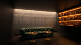 Strap engraved felt wall panels in Ash Grey, behind a bar