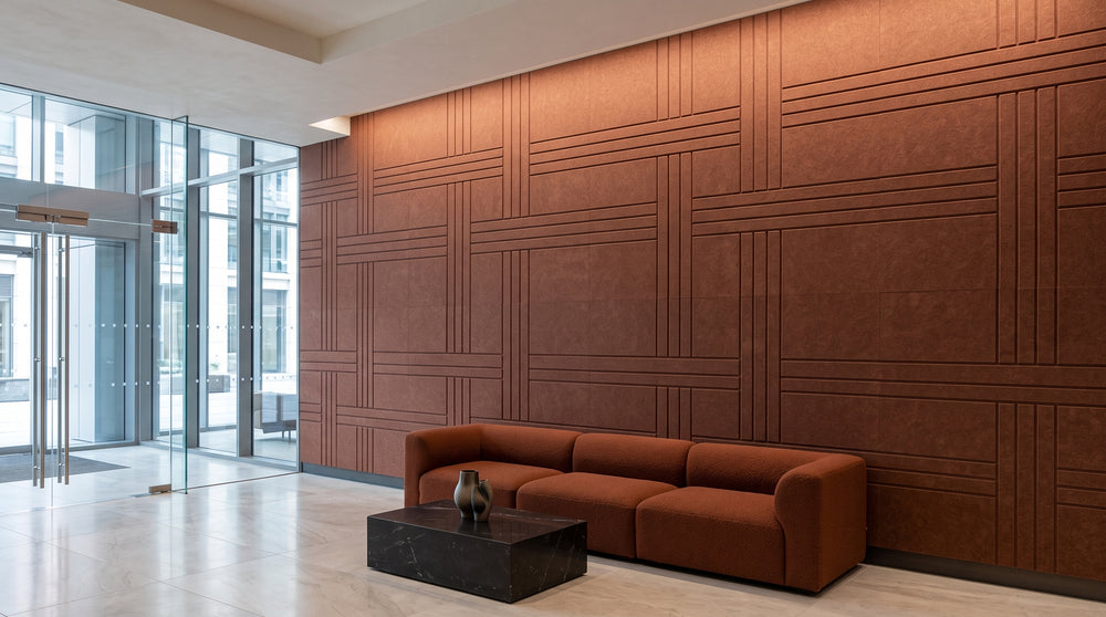 Strap engraved felt wall panels in Cinnamon, in a reception area