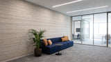 Strata engraved felt wall panels in Blanched Almond, in an office