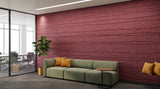 Strata engraved felt wall panels in Claret, in an office