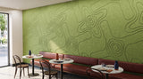 Terrain engraved felt wall panels in Apple Green, in a restaurant