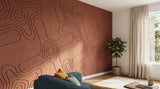 Terrain engraved felt wall panels in Cinnamon, on a living room wall