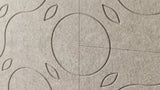 Vine engraved felt wall panels in Blanched Almond, close-up of the engraved grooves