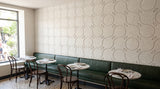 Vine engraved felt wall panels in Natural Cotton, in a restaurant