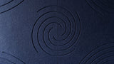Vortex engraved felt wall panels in Oxford Blue, close-up of the engraved grooves