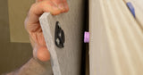 Felt acoustic wall panel held to the wall with hidden Button-fix Type 3 fixings